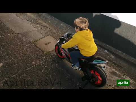 PATOYS | Injusa | Official Licensed MOTO Rcing Aprilia Ride on Bike 12 volt ride on dirt Bike for Kids (Silver) (64900)